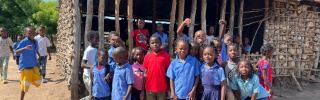 Children together outside their school in Mozampbique