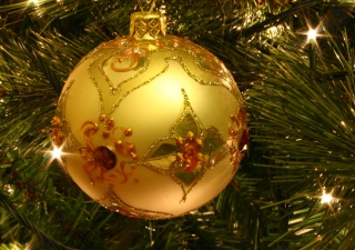 Image of a golden Christmas bauble.