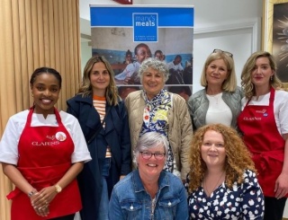 Clarins and staff from Mary's Meals Ireland posing together for a photo. 